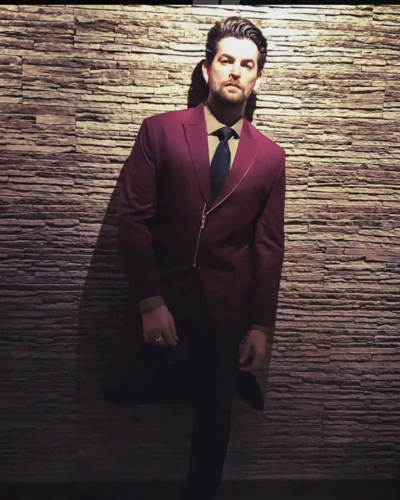 Neil Nitin Mukesh in AK Burgundy Single Zip Lapel Suit